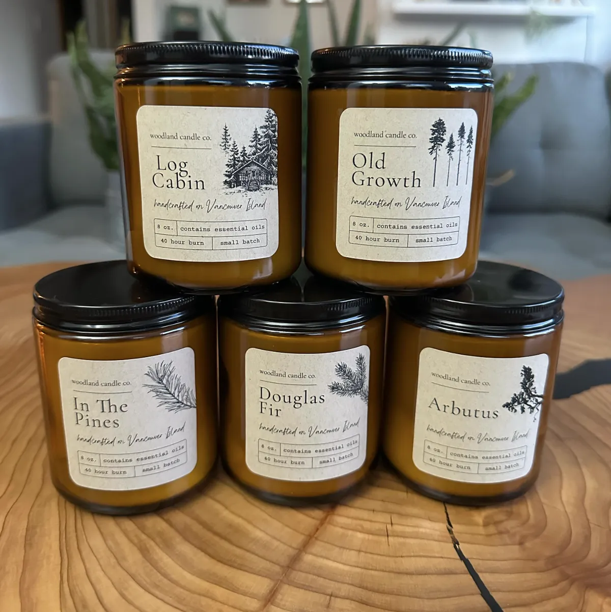 All five Woodland candles stacked together